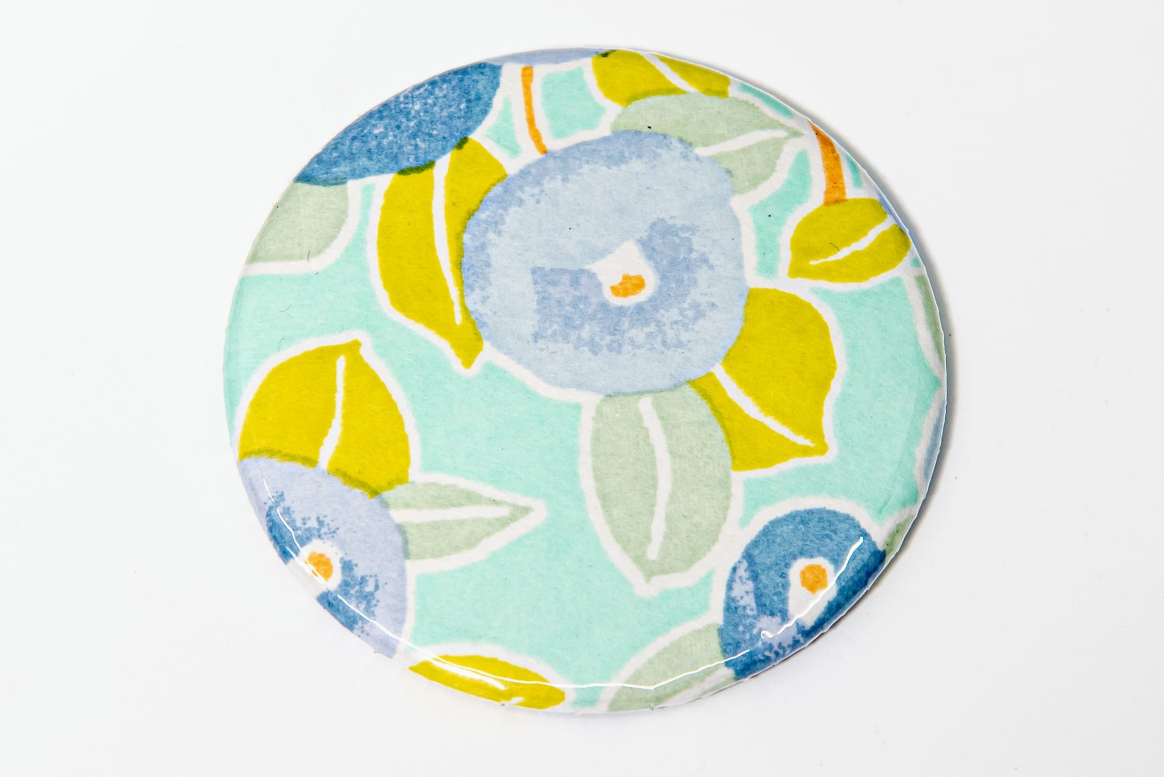 Miroir de poche « fleurs bleues fond turquoise »