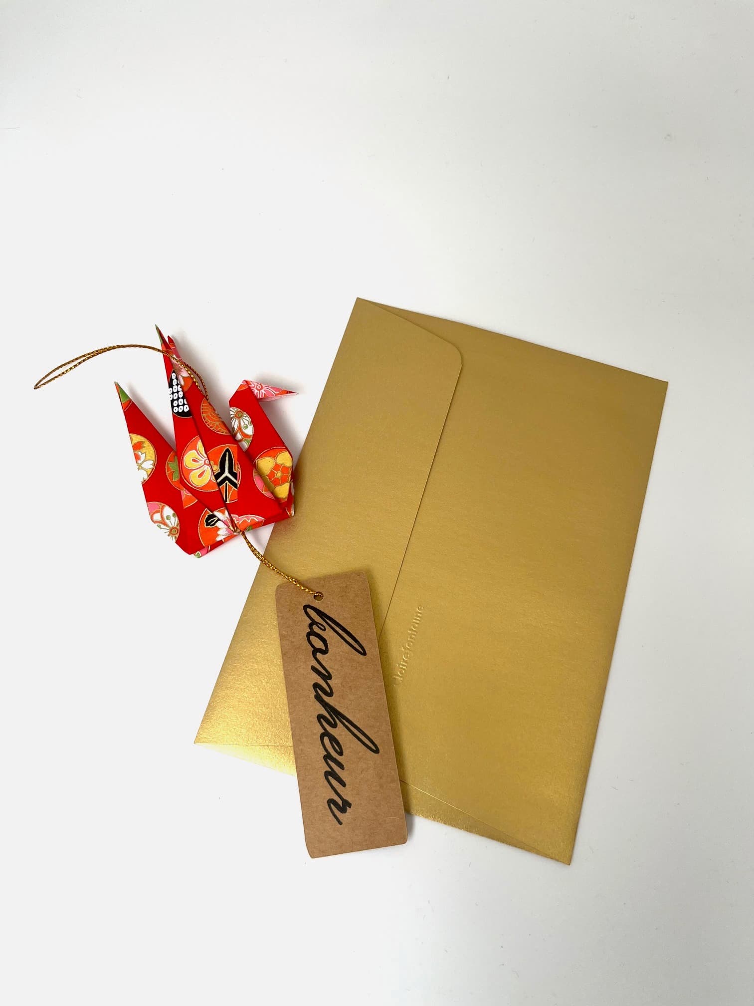 Grue voyageuse « bonheur » rouge