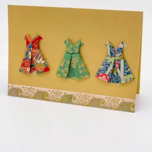 Carte « petites robes » dorée
