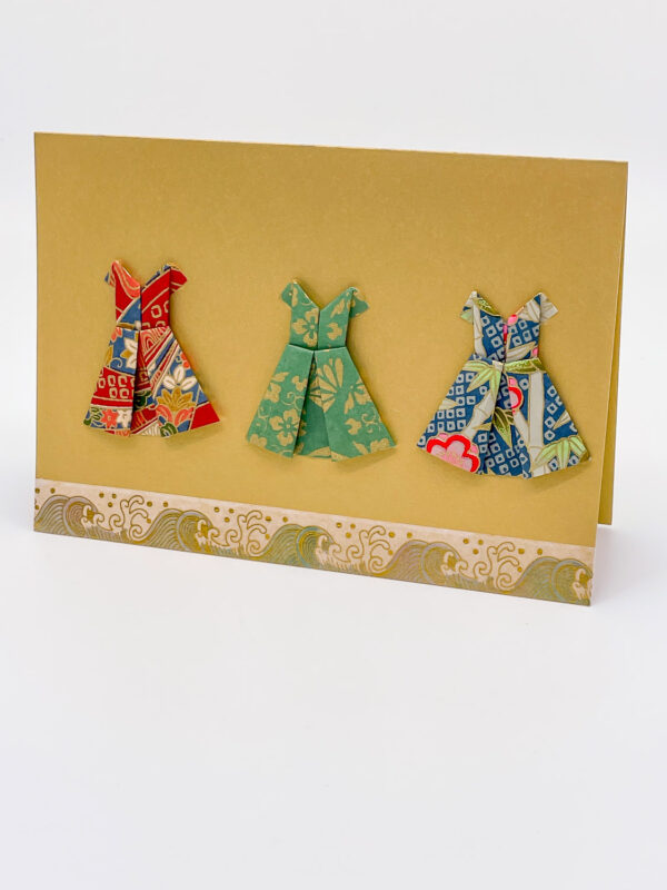 Carte « petites robes » dorée