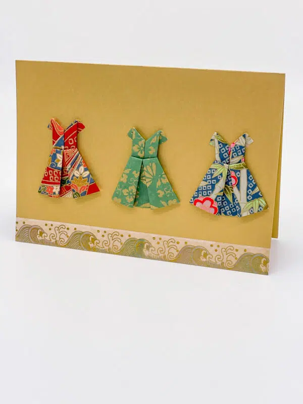 Carte « petites robes » dorée