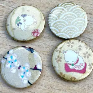 Lot de magnets Niko Niko dorés